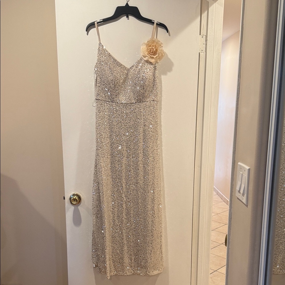 Elegant Sequin Dress with Floral Accent